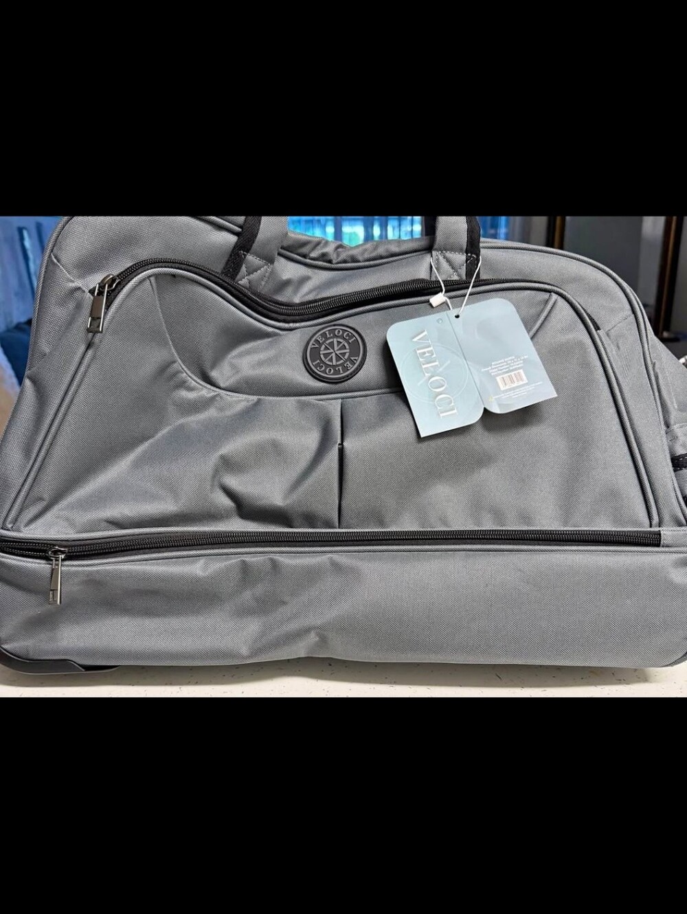 Brand new rolling Duffle bag by veloci.(i Have The Set On My Page In Other Posts